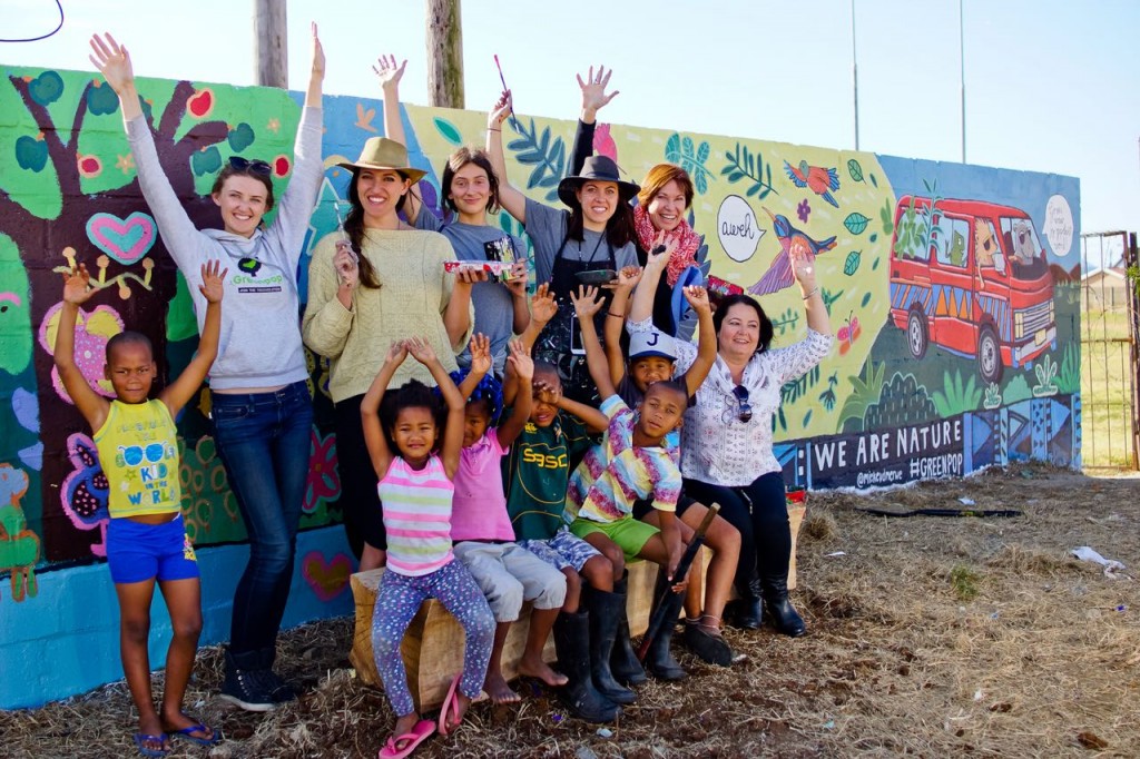 Week 3 - participants and children from Seven Passes Initiative painting the Touws Ranten mural