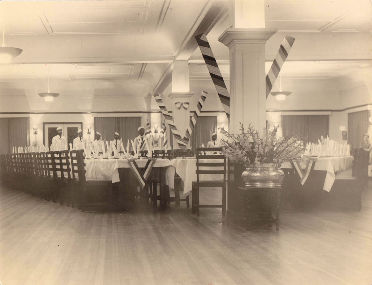 Celebration of VE Day in the dining room of the BI Hotel, 9 May 1945