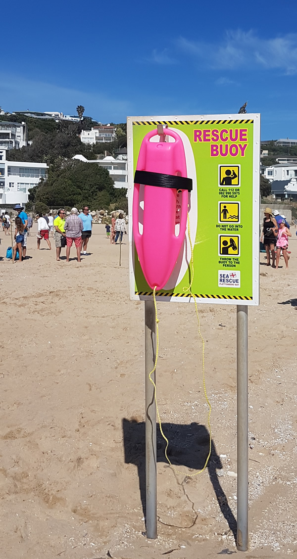 A pink torpedo buoy at Lookout Beach in Plettenberg Bay